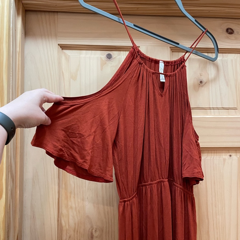 Women’s orange/rust dress with slit on front. Worn once to a wedding